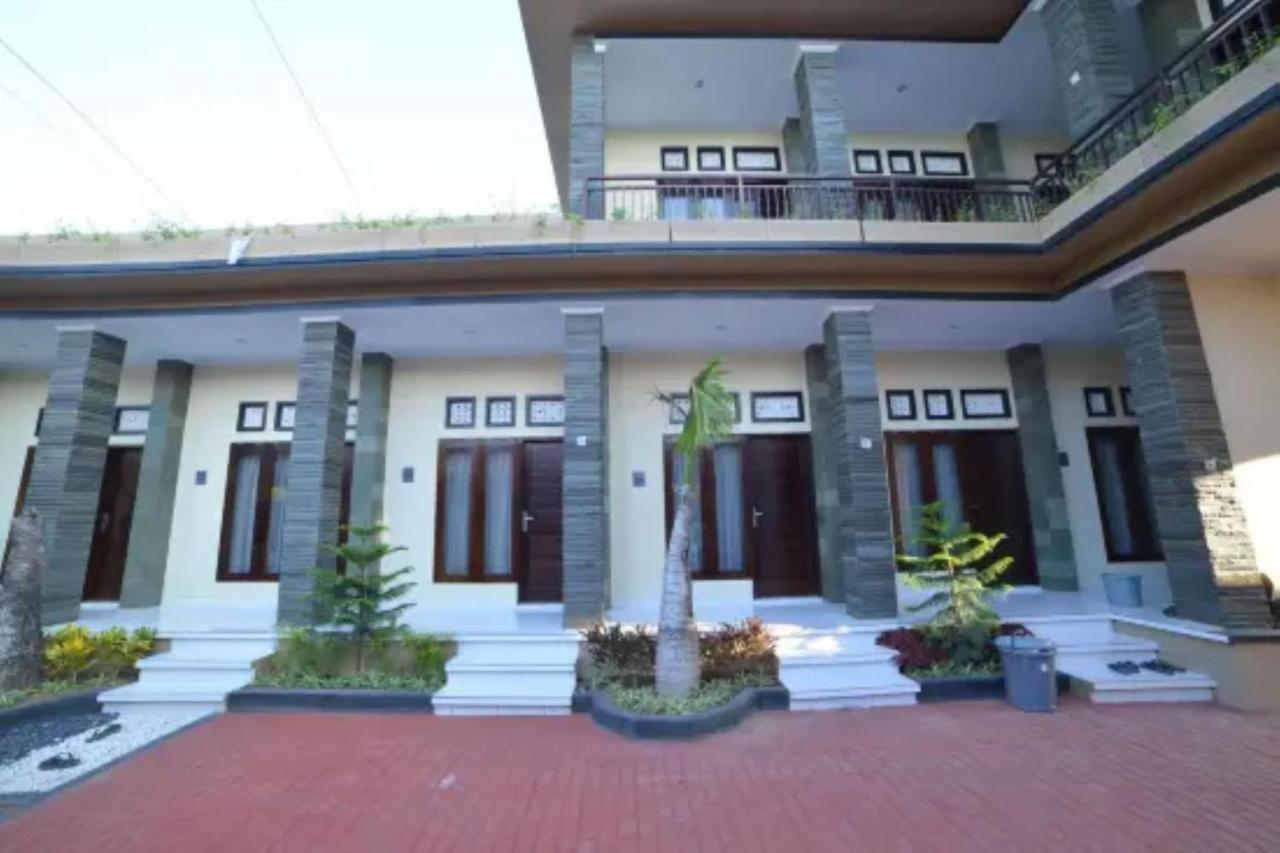 Oyo Flagship 91237 Ratu Guest House Kedunganan Bagian luar foto