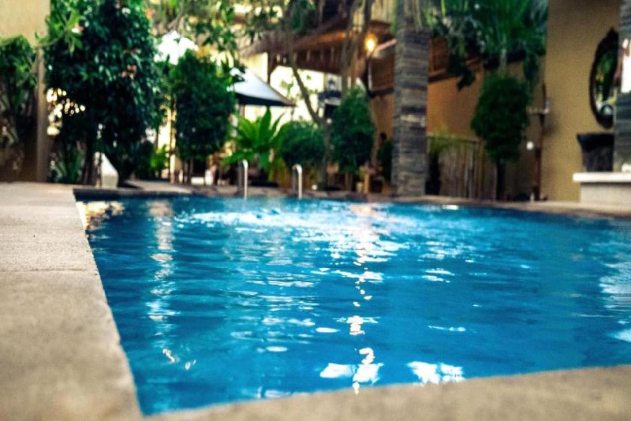 Oyo Flagship 91237 Ratu Guest House Kedunganan Bagian luar foto