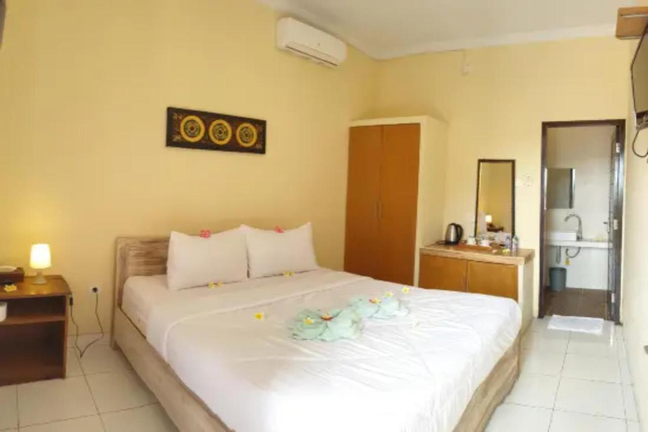 Oyo Flagship 91237 Ratu Guest House Kedunganan Bagian luar foto