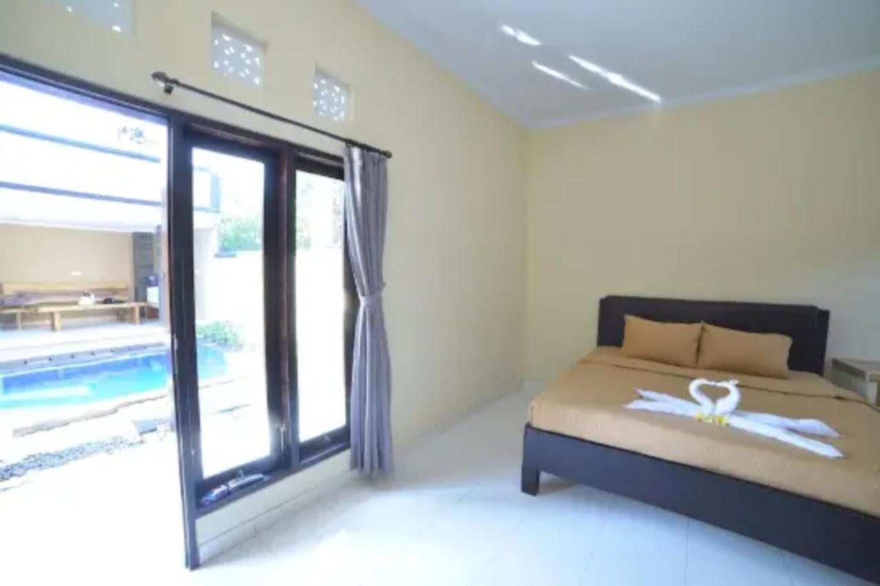 Oyo Flagship 91237 Ratu Guest House Kedunganan Bagian luar foto