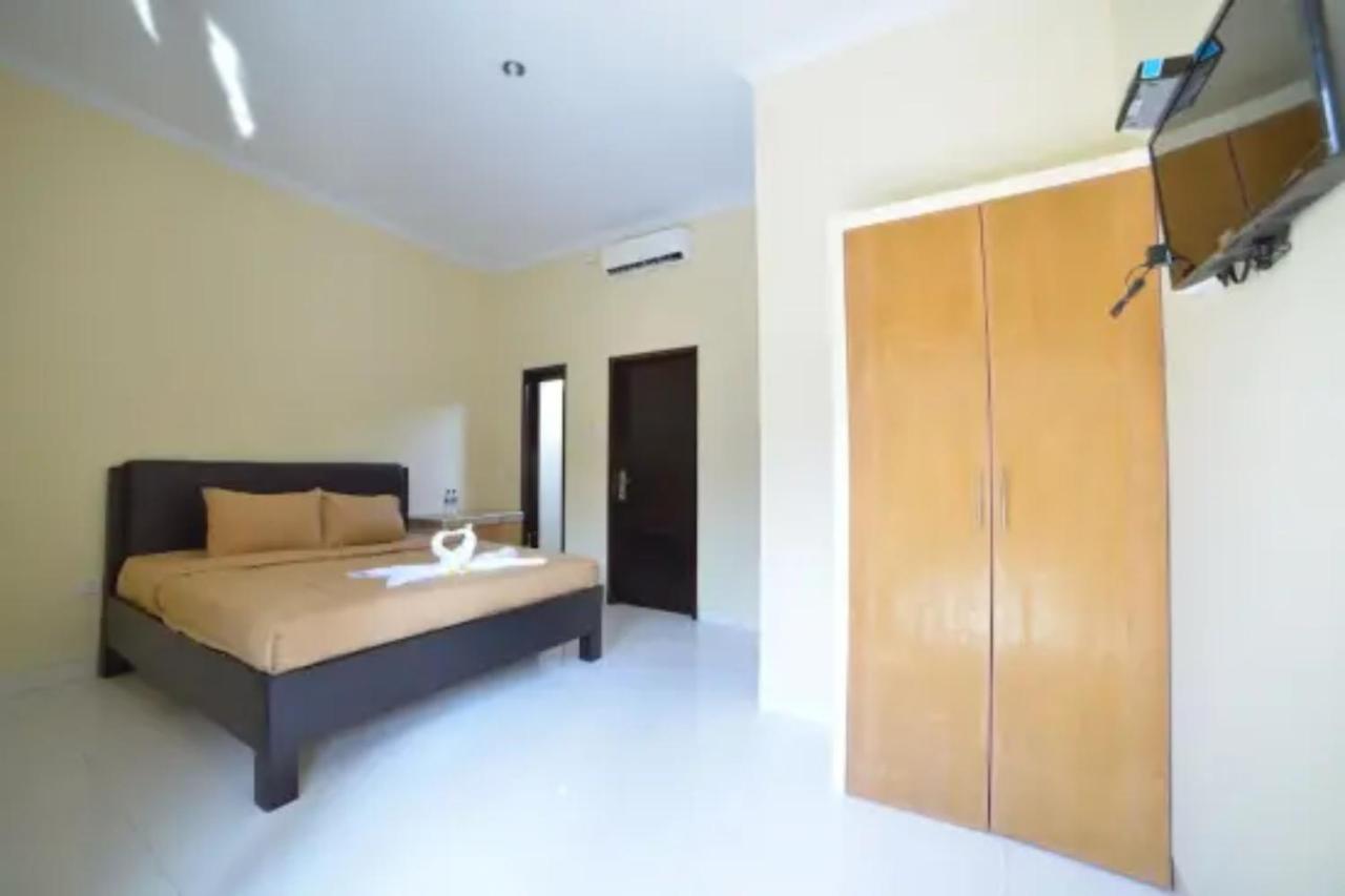Oyo Flagship 91237 Ratu Guest House Kedunganan Bagian luar foto