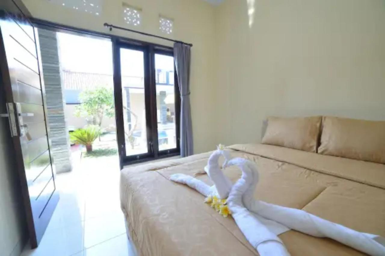 Oyo Flagship 91237 Ratu Guest House Kedunganan Bagian luar foto