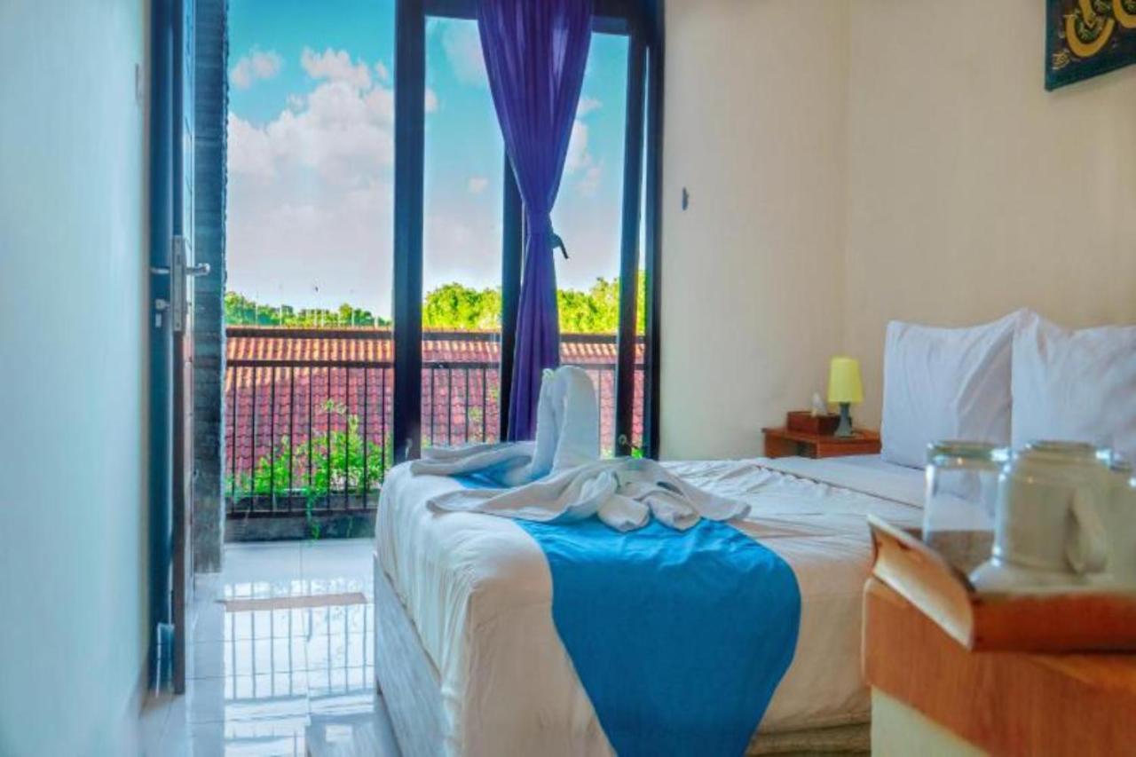 Oyo Flagship 91237 Ratu Guest House Kedunganan Bagian luar foto