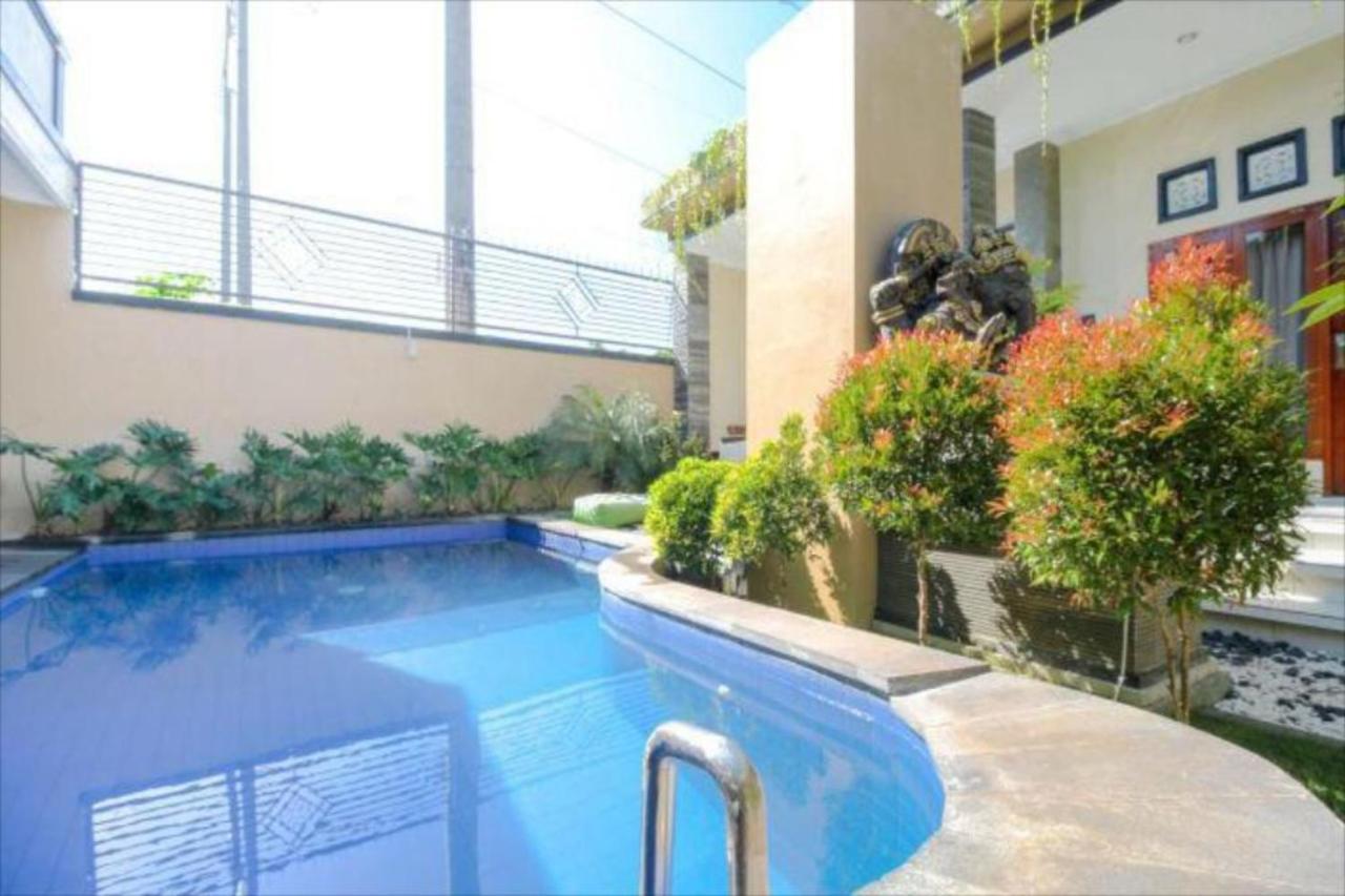 Oyo Flagship 91237 Ratu Guest House Kedunganan Bagian luar foto