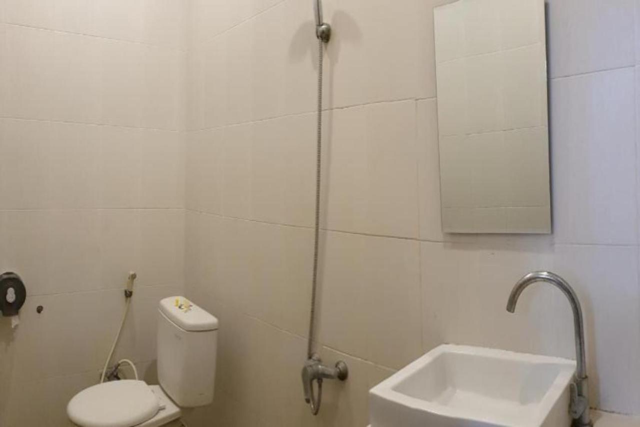 Oyo Flagship 91237 Ratu Guest House Kedunganan Bagian luar foto